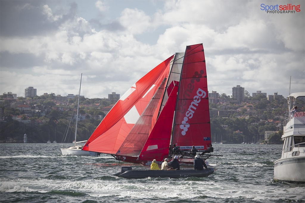 Looks like a photo finish for 3rd place over the line with Thurlow Fisher and C-tech already home in day 4 of the JJ Giltinan 2013 - 18ft Skiff JJ Giltinan Championships 2013 - Day 4  © Beth Morley - Sport Sailing Photography http://www.sportsailingphotography.com